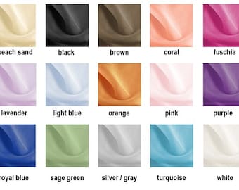 May include: A color chart showing 21 different fabric swatches. The swatches are arranged in three rows of seven. The colors are: aqua, beach sand, black, brown, coral, fuchsia, gold, ivory, lavender, light blue, orange, pink, purple, red, rose, royal blue, sage green, silver/gray, turquoise, white, and yellow.