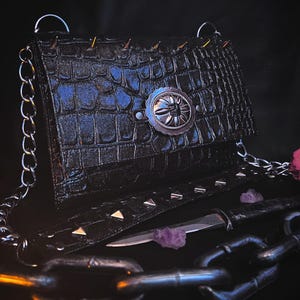 Ámame como un reptil Hombro/Clutch