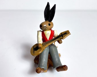 Old Easter bunny with guitar and tree trunk carved by hand Erzgebirge 60s GDR