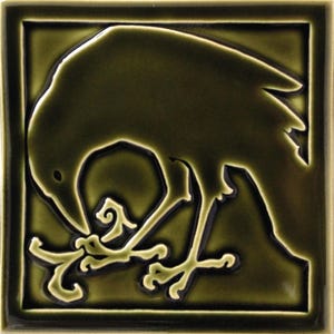 May include: Square ceramic tile featuring a stylized kiwi bird in shades of olive green. The bird is depicted with its beak touching the ground, with a detailed outline and a glossy finish. The tile has a dark green border.