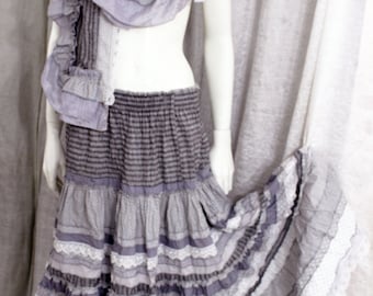 Maxi gray boho skirt with shall from line and cambric .
