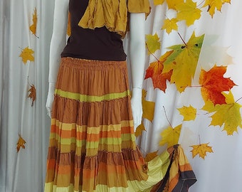 Leaffall - a picturesque yellow tiered long skirt from silk and viscose. Boho chic style.