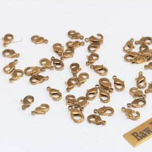 Cierres de garra de latón crudo de 9 mm, cierres de pinza de langosta, cierres para collares, materiales para bisutería, accesorios de latón crudo, NLC, CLO1