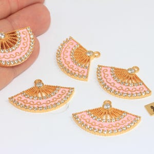 May include: A set of three ceramic mugs with a speckled, matte finish. The mugs are in shades of cream, light gray, and dark gray. Each mug has a simple, minimalist design, perfect for coffee or tea.