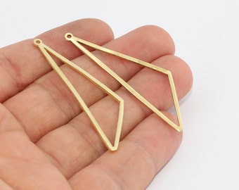 May include: Two gold-colored, geometric earring components. Each component has a long, slender, open diamond shape with a small hole at the top for attachment. The components are made of a thin metal.