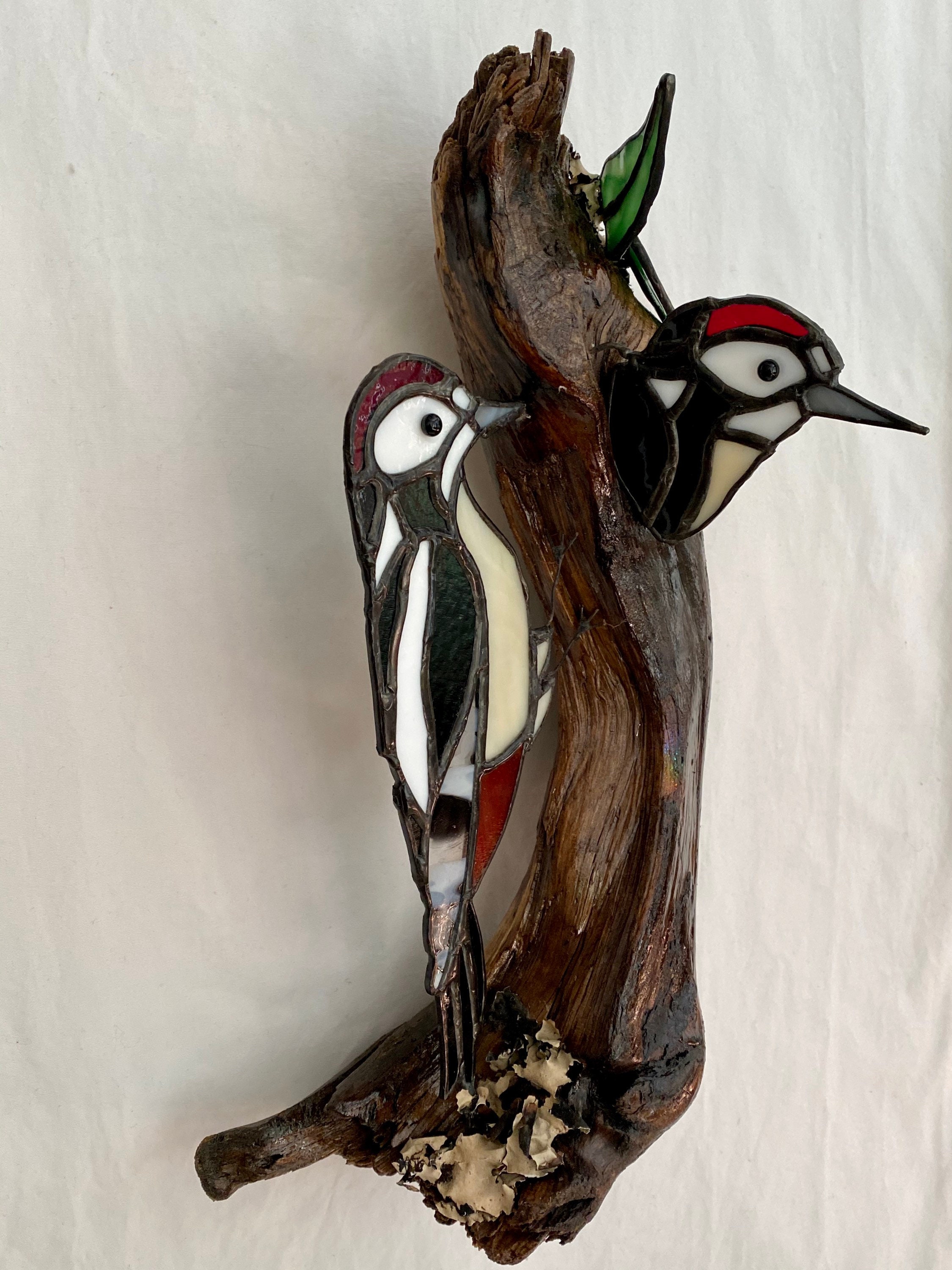 stained-glass-wood-pecker-on-driftwood