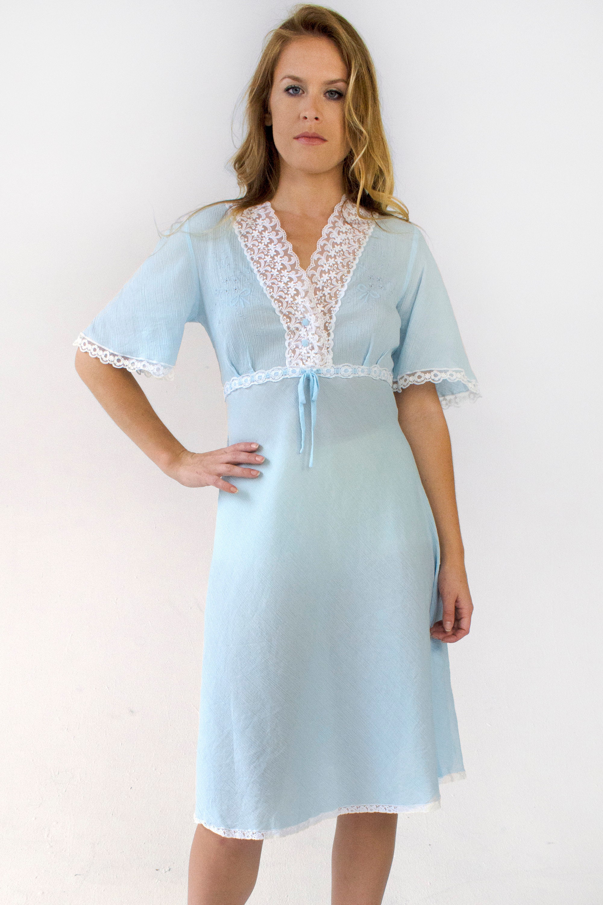 baby blue bell sleeve dress