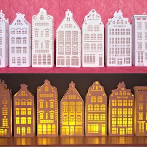 Casa di città di carta del villaggio di Natale - con candele a LED bianco caldo - kit fai-da-te parzialmente assemblato, decorazioni per la casa fatte a mano, taglio della carta