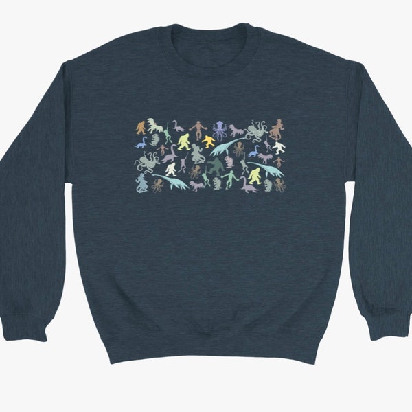 Cryptid sweater featuring pastel assorted cryptids, cryptidcore sweater, cryptozoology sweatshirt, cryptid jumper, cryptid lover gift