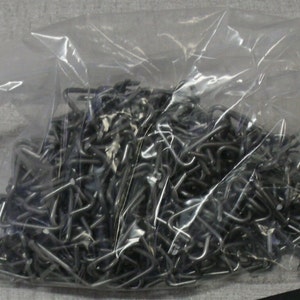 Hog rings bag of 400 pieces for auto upholstery seat covers installation. Free shipping in USA only.
