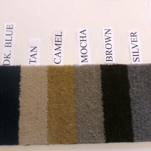 May include: A fabric swatch with 10 different color options: black, maroon, dark blue, tan, camel, mocha, brown, silver, salt & pepper, and storm grey.