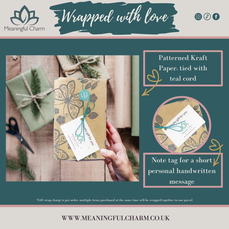 May include: A rectangular gift box wrapped in brown kraft paper with a black butterfly and floral pattern. The box is tied with teal cord and features a white gift tag with the text "lovely gift for you" and a small teal circular sticker.