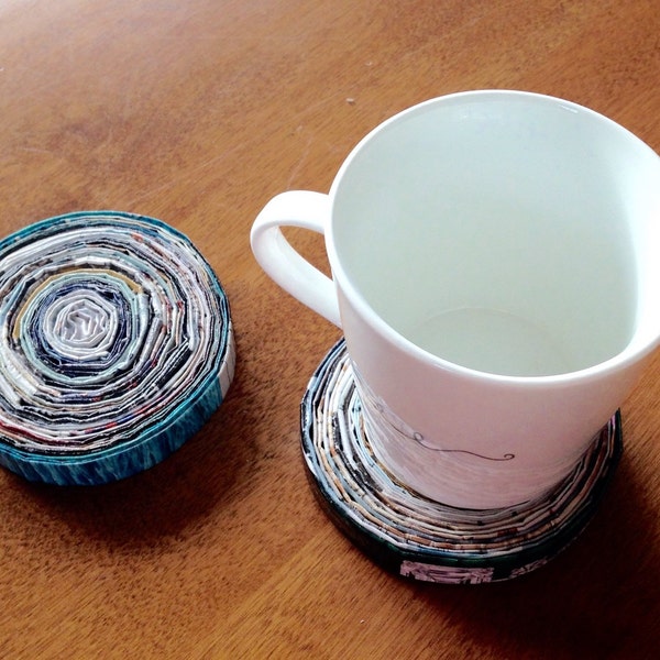 A pair of recycled paper coasters