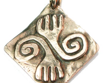 African Symbol of Cooperation - Kiln Fired Bronze Pendant