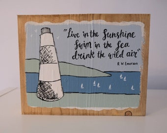 Swim in the sea... - Emerson quote on wood