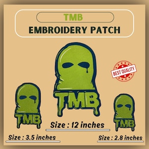 May include: Three embroidered patches featuring a green cartoon face with a black ski mask and the text "TMB". The patches are available in three sizes: 12 inches, 3.5 inches, and 2.8 inches.