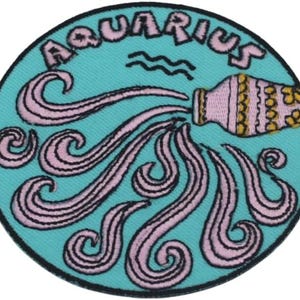 May include: A round patch with the word "AQUARIUS" in pink letters at the top. The patch features a light blue background with a pink pitcher pouring water. The water flows in swirling pink lines with black outlines.