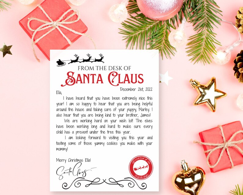 May include: A Christmas-themed letter from Santa Claus, featuring a red and white design with festive illustrations. The letter is addressed to "Ela" and includes a personalized message. The image is surrounded by Christmas decorations.