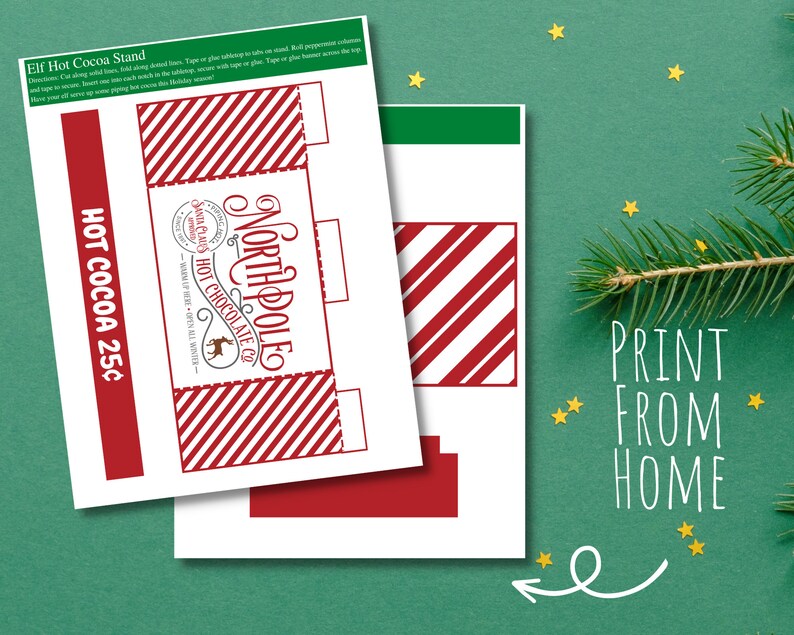 May include: Printable template for a North Pole Hot Chocolate stand. The design features red and white stripes, a Santa Claus logo, and the text "North Pole Santa Claus Hot Chocolate Co." and "Hot Cocoa 25&cent;".