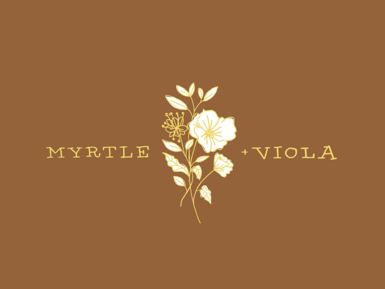 May include: A logo design with the text "MYRTLE + VIOLA" in a yellow font. The logo features a stylized illustration of a bouquet of flowers in yellow.
