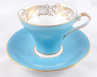 Aynsley - Ensemble de tasse à thé et soucoupe en porcelaine tendre bleue, finitions dorées