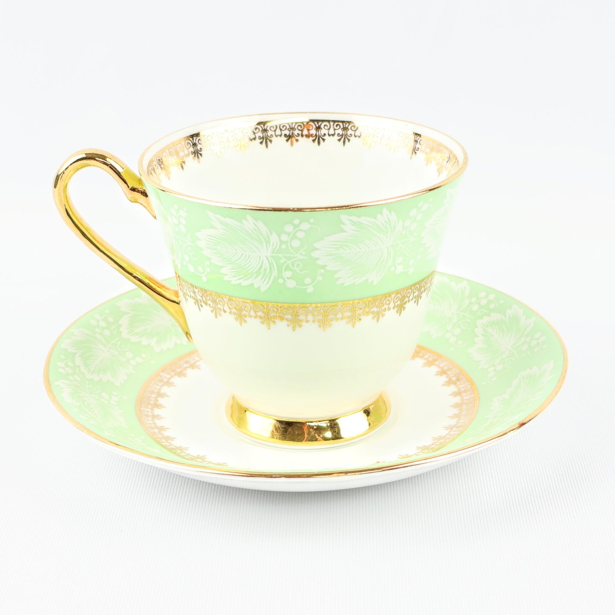 Antique Wedgewood Porcelain Tea Cup and Saucer. White & Gold