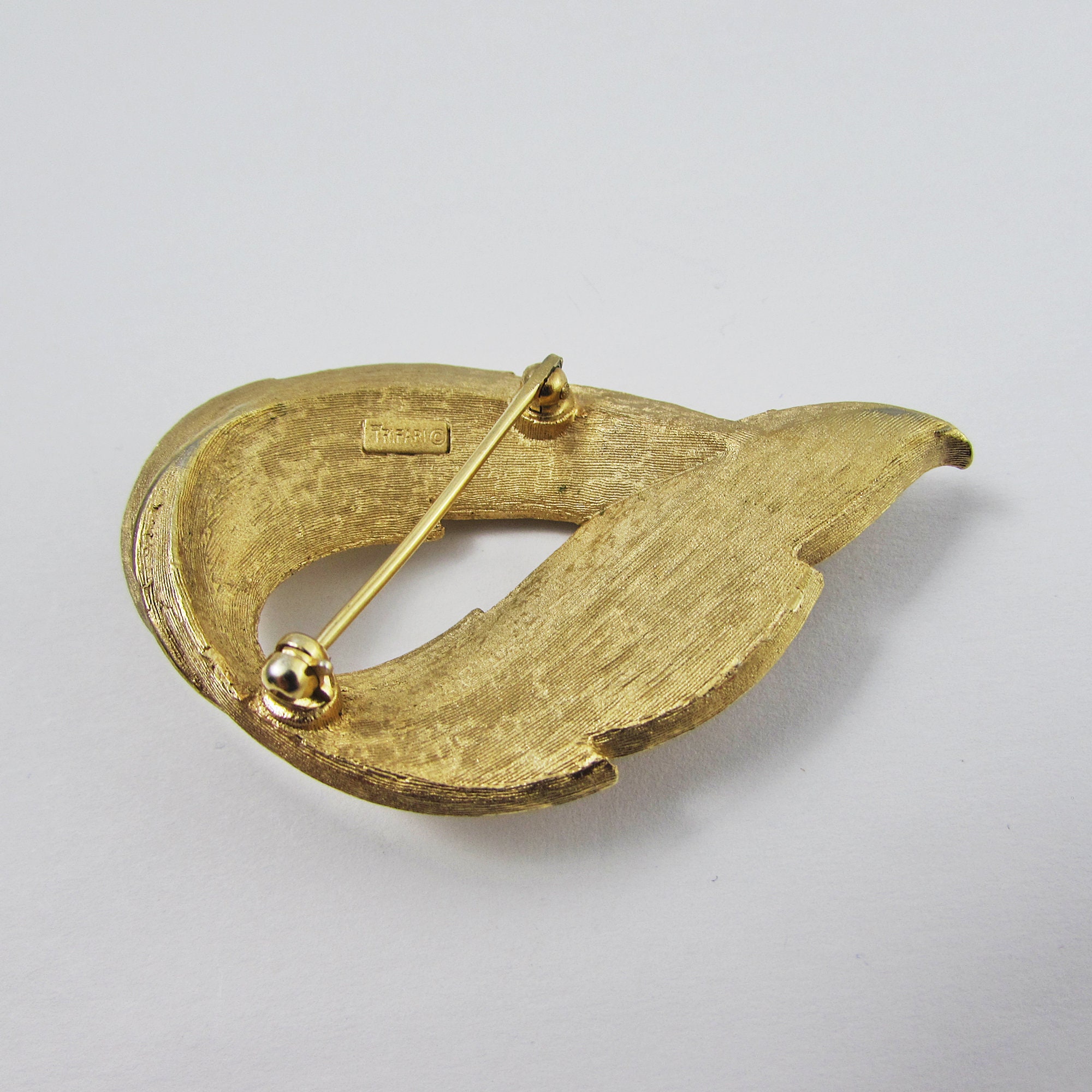 Trifari brooch value discount