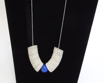 Legally a Necklace -- Paper Disc and Blue Bead made from law books