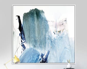 May include: Abstract painting with blue, green, and white brushstrokes on a white canvas. The painting is framed in a white frame and is hanging on a white wall.