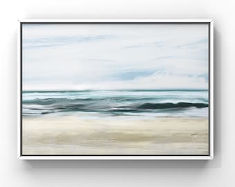May include: A framed abstract painting of a seascape with a light blue sky, white clouds, and a turquoise ocean with white foamy waves crashing on a sandy beach.