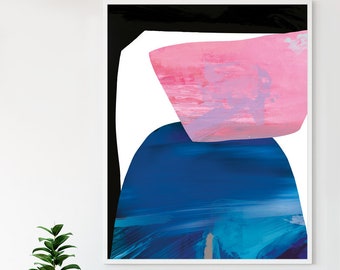 May include: Abstract art print featuring a pink, blue, and black colour scheme. The print is framed in a white frame and is hanging on a white wall.