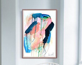 May include: Abstract painting in a wooden frame with pink, blue, green, and black paint strokes. The painting is signed in the bottom right corner.