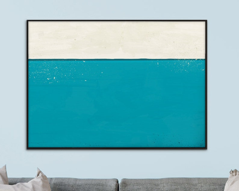 May include: Abstract art print with a white top section and a teal blue bottom section. The print has a textured look.