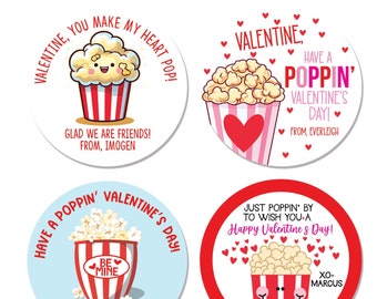 May include: Four round Valentine's Day stickers with a popcorn theme. Each sticker features a different message and a cartoon image of a popcorn bucket. The first sticker says "Valentine, you make my heart pop!" and features a popcorn bucket with a smiling face. The second sticker says "Have a poppin' Valentine's Day!" and features a popcorn bucket with a red heart. The third sticker says "Have a poppin' Valentine's Day!" and features a popcorn bucket with the words "Be Mine". The fourth sticker says "Just poppin' by to wish you a Happy Valentine's Day!" and features a popcorn bucket with a smiling face.
