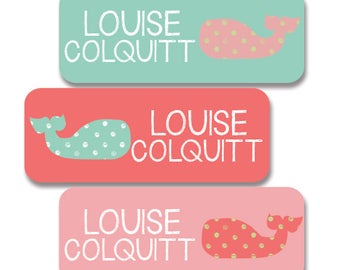 May include: Three colorful labels with a whale design and the name "LOUISE COLQUITT" printed in white. The labels are in pink, red, and light blue.