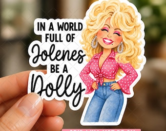 May include: A die-cut sticker featuring a cartoon illustration of a blonde woman with voluminous hair, wearing a pink polka-dot tied blouse and blue jeans. The text reads: IN A WORLD FULL OF Jolenes BE A Dolly. The sticker has a white border.