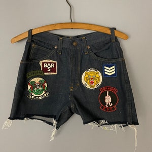 Vintage 70s denim jean shorts with patches, daisy dukes, cut off shorts