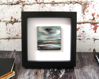Sweeping Plain - Fused glass, enamel mini painting. WL441. Stormy skies over a rugged abstract landscape 17.5 x 17.5cm black box frame
