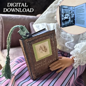 May include: A miniature book titled "Anne of Green Gables" with a brown cover and a green bookmark. The book is open, revealing interior pages with text and illustrations. The image also includes the text "DIGITAL DOWNLOAD".