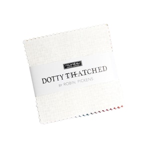 May include: A stack of white fabric squares with a textured pattern, wrapped with a white band. The band features the text "DOTTY THATCHED" and "BY ROBIN PICKENS". The fabric squares are from "moda FABRICS + SUPPLY".