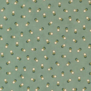 May include: A teal fabric with a repeating pattern of small, connected circles. Each circle pair features a white and a green-and-gold element, creating a scattered, all-over design. The fabric has a slightly textured appearance.