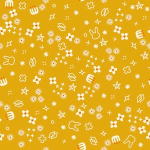 May include: Mustard yellow background with a repeating pattern of white and orange floral, star, cross, and geometric shapes. The design includes small rabbit and crown illustrations.