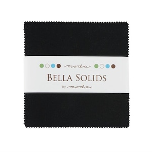 May include: A stack of black fabric squares, wrapped with a white band featuring the text "BELLA SOLIDS by moda" and colorful dots. The fabric has a textured appearance, suitable for quilting and crafting projects.