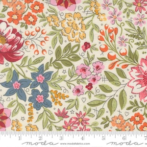 May include: A cream-colored fabric featuring a dense floral pattern with orange, yellow, pink, and blue flowers, green leaves, and small berry clusters. A white ruler at the bottom shows measurements in inches, with the text moda and modafabrics.com.