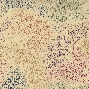 May include: A cream-colored fabric with a scattered pattern of small, multi-colored dots. The dots are in shades of blue, green, red, orange, and brown.