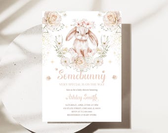 May include: A baby shower invitation with a pink and white floral design featuring a bunny rabbit wearing a flower crown. The text reads "Somebunny Very Special is on the Way" and includes the name "Ashley Smith".