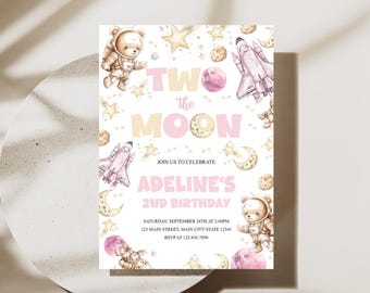 May include: A pink and gold birthday invitation with a space theme. It features a teddy bear astronaut, a rocket ship, stars, and the text "Two the Moon" and "Adeline's 2nd Birthday".