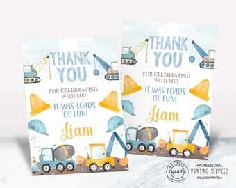 Op de afbeelding: Twee blauwe en gele bedankkaartjes met illustraties van bouwvoertuigen. De tekst op de kaartjes luidt "Bedankt voor het vieren met me! Het was super leuk! Liam".