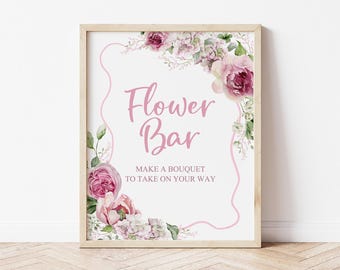 May include: A printable sign with pink floral illustrations and the text "Flower Bar" and "Make a bouquet to take on your way".