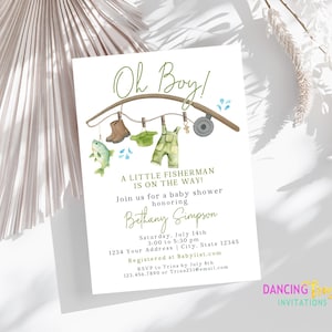 May include: Baby shower invitation with watercolor illustrations of fishing gear, including a fish, boots, overalls, and a fishing reel. The text reads "Oh Boy! A Little Fisherman Is On The Way!" and includes event details.